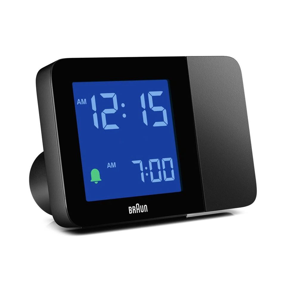 Black Braun BC15BUS projection alarm clock with its LCD backlight on